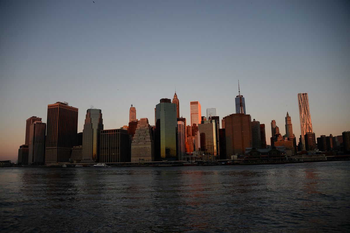 05 The First Rays Of Sunrise Shine On New York Financial District Skyline From Brooklyn Heights